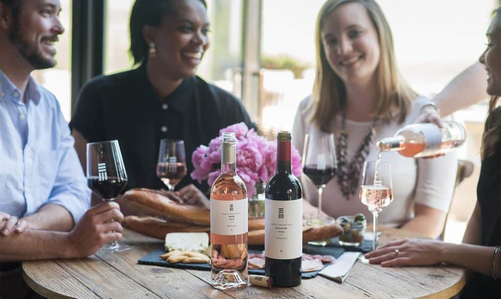 Photo of people enjoying wine at Early Mountain Vineyards