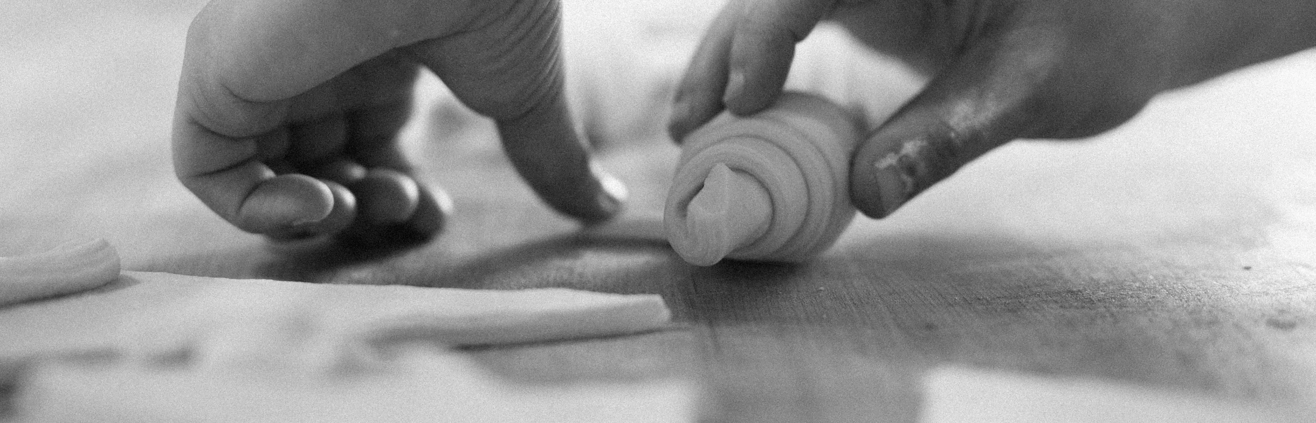 Rolling dough on wood