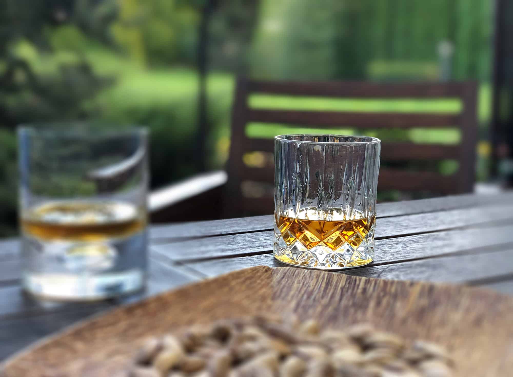 glass of whiskey on table