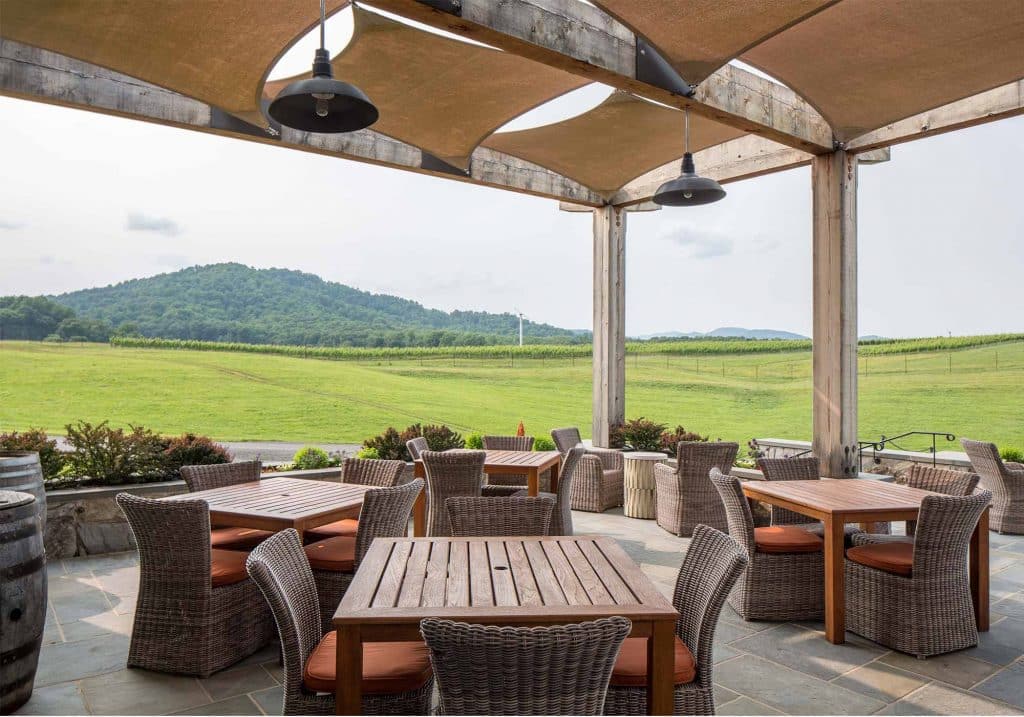 Photo of tables and chairs outside at Early Mountain Vineyards