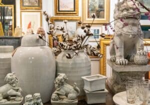 Foo dogs, vases and a wall of art at Middleburg Antiques Gallery in Middleburg, VA