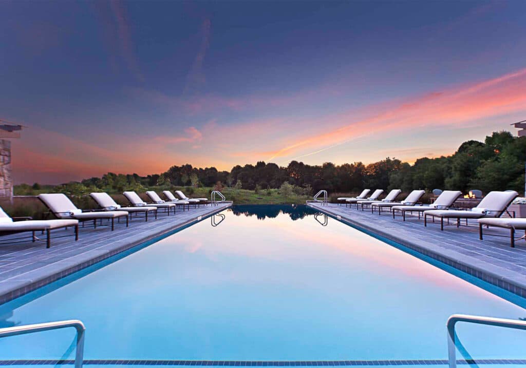 Sunset at Salamander Middleburg's luxury resort pool in Virginia hunt country.