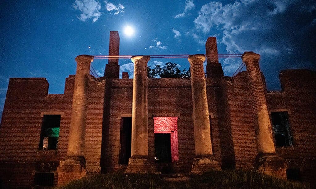 A moody night sky and the moon at Barboursville Vineyards Ruins.
