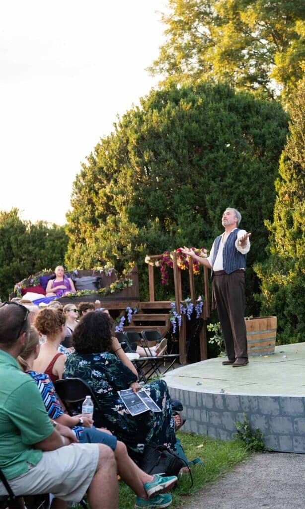 The audience enjoying outdoor theatre at Shakespeare at the Ruins at Barboursville Vineyards in Virginia Wine Country.