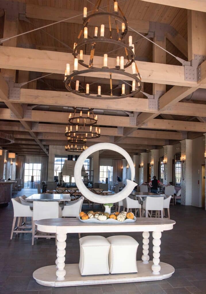 The stunning iron chandeliers and beams in the rustic tasting room at Early Mountain Vineyards.