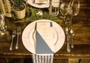 Photo of a table setting with menu card on plate at Bluemont