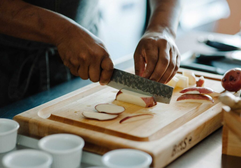 chef antwon brinson chopping vegetables