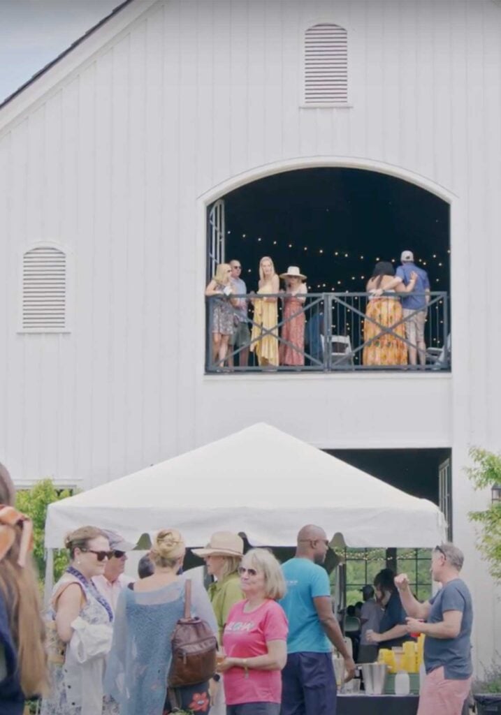 People sample wine from Starburn Winery at the United Bank Bloomin' Wine  Festival on Friday April 28, 2017 in Winchester, Va.. The wine festival,  which continues on Saturday, officially kicked-off the start