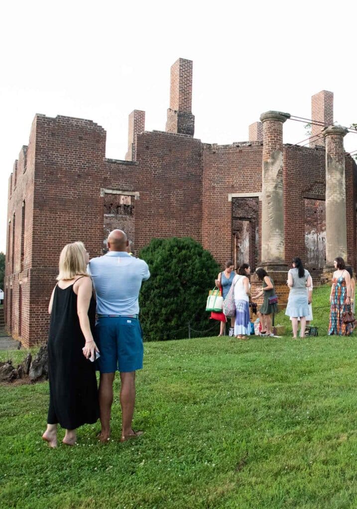 Guests enjoy wine and picnics on the lawn where Shakespeare at the Ruins is performed in summer by the Barboursville Four County Players.