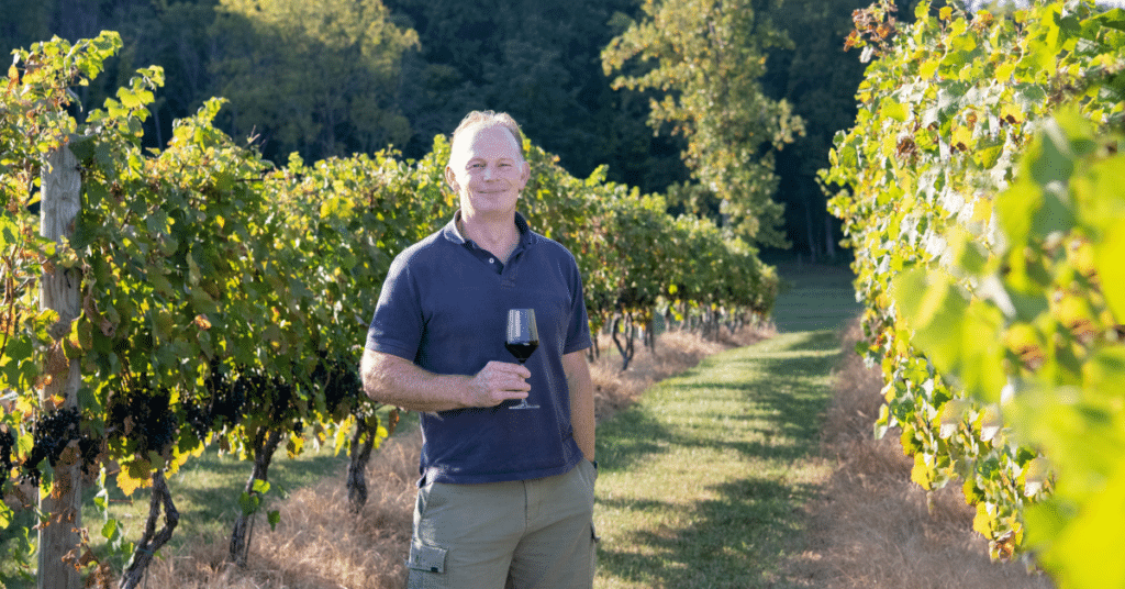 Southwest Mountains Vineyards' winemaker, Boela Gerber, formerly of Groot Constancia in South Africa, taking a break from the grape harvest for a glass of red wine.