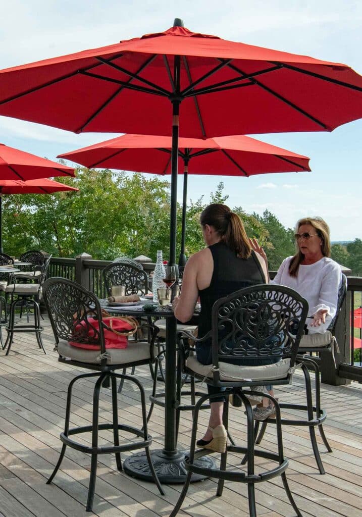Southwest Mountains Vineyards’ outdoor patio with red umbrellas