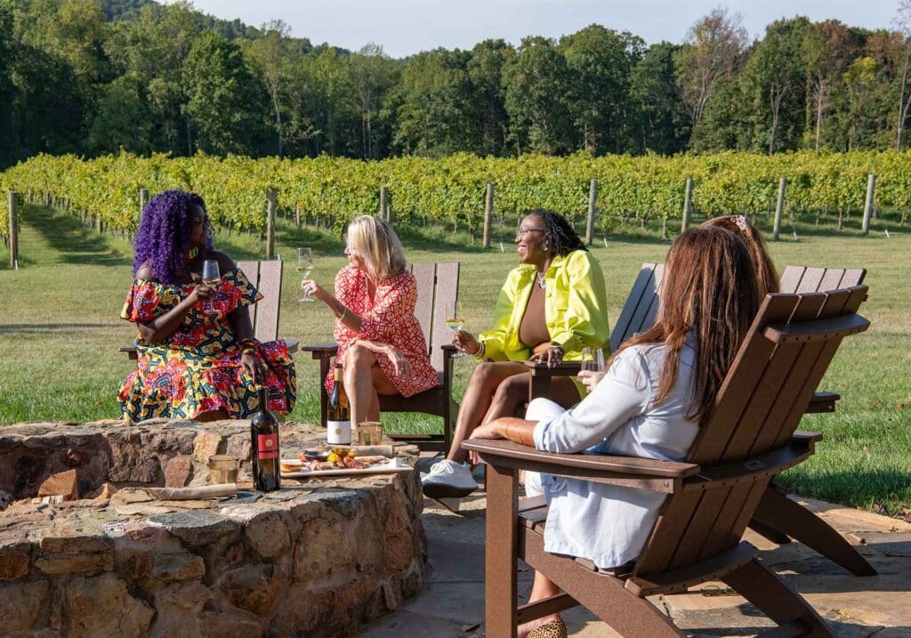 Southwest Mountains Vineyards’ women enjoying wine on the outdoor patio