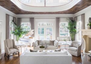 White living room with white baby grand piano by designer Casey Sanford
