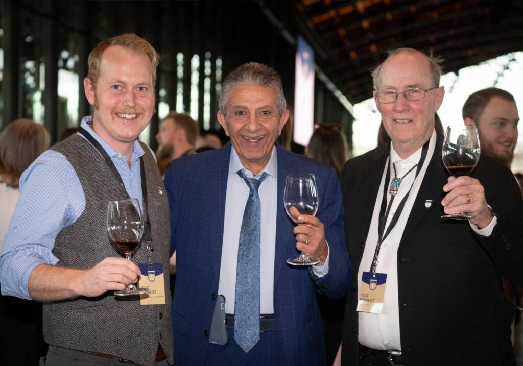 Photo of three Shenandoah Valley winemakers celebrate gold medals at 2024 Governor's Cup Gala in Richmond's Main Street Station.