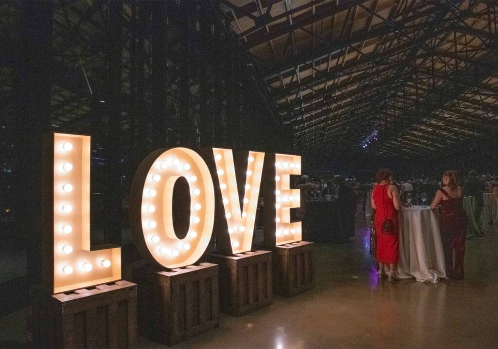 Photo of the lighted up LOVE sign at the 2024 Virginia Governor's Cup Gala.