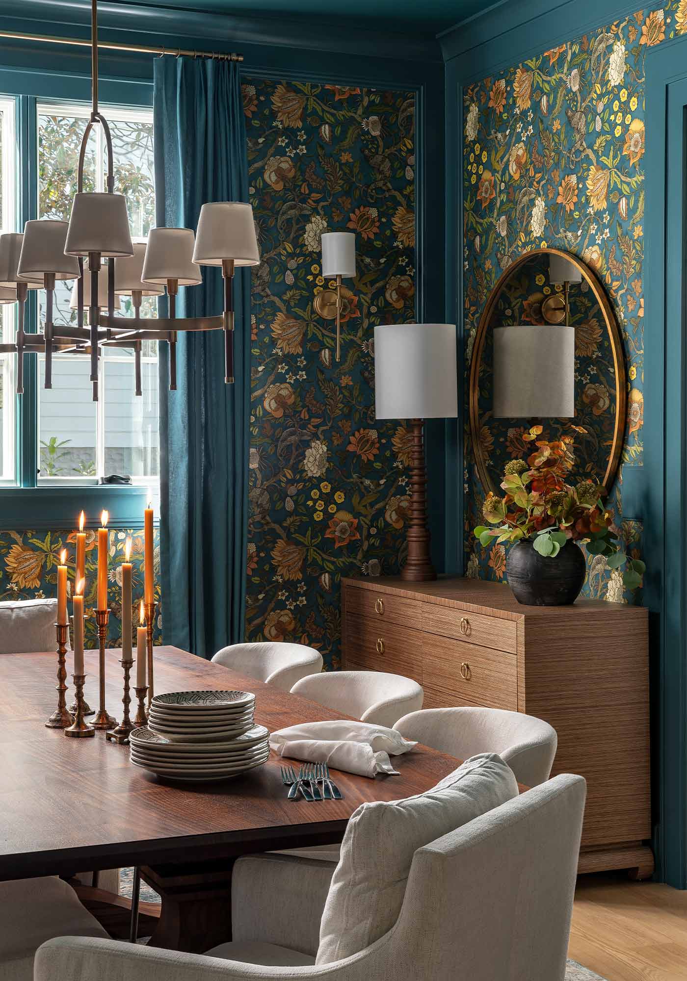dining room with deep teal floral wallpaper and trim moody sophisticated