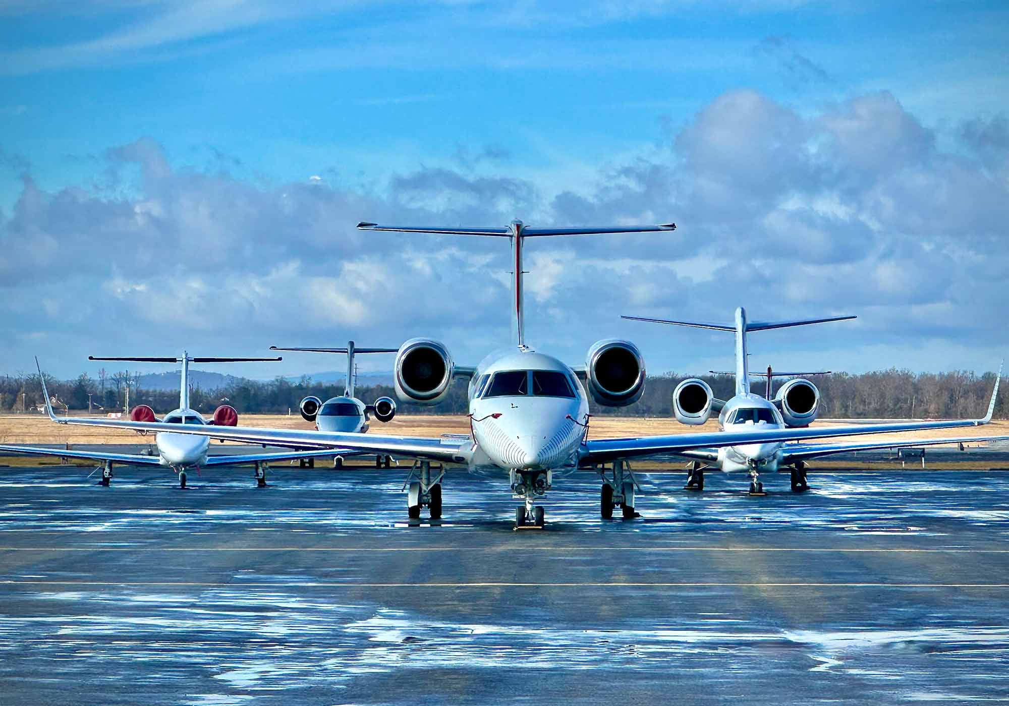 private jets on a tarmac