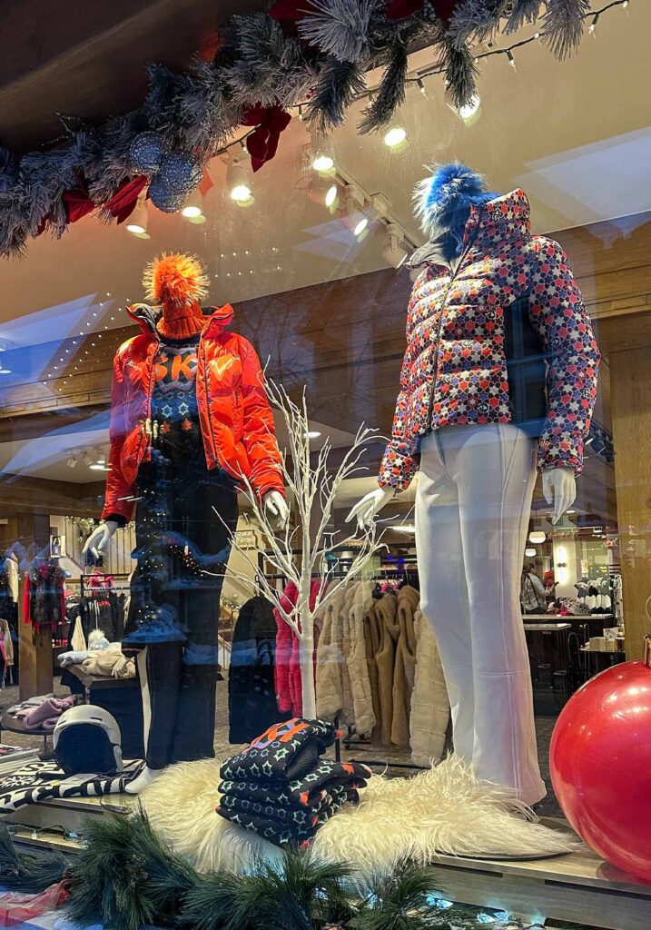 Mannequins dressed in winter ski gear displayed in a Vail, Colorado store window.