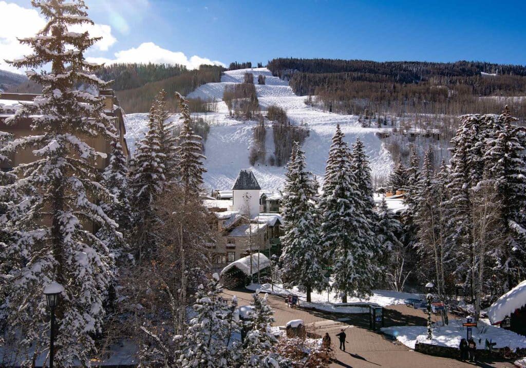 Bird’s-eye view of Vail ski resort, highlighting its Alpine architecture and sprawling ski terrain.