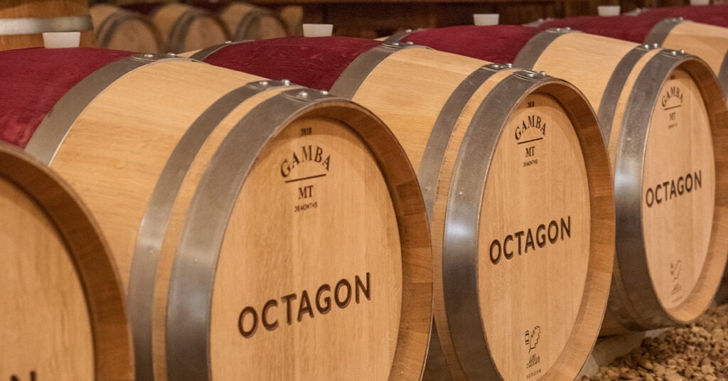 Barrels of aging award-winning Octagon wine in the barrel room at Barboursville Vineyards