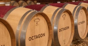 Barrels of aging award-winning Octagon wine in the barrel room at Barboursville Vineyards