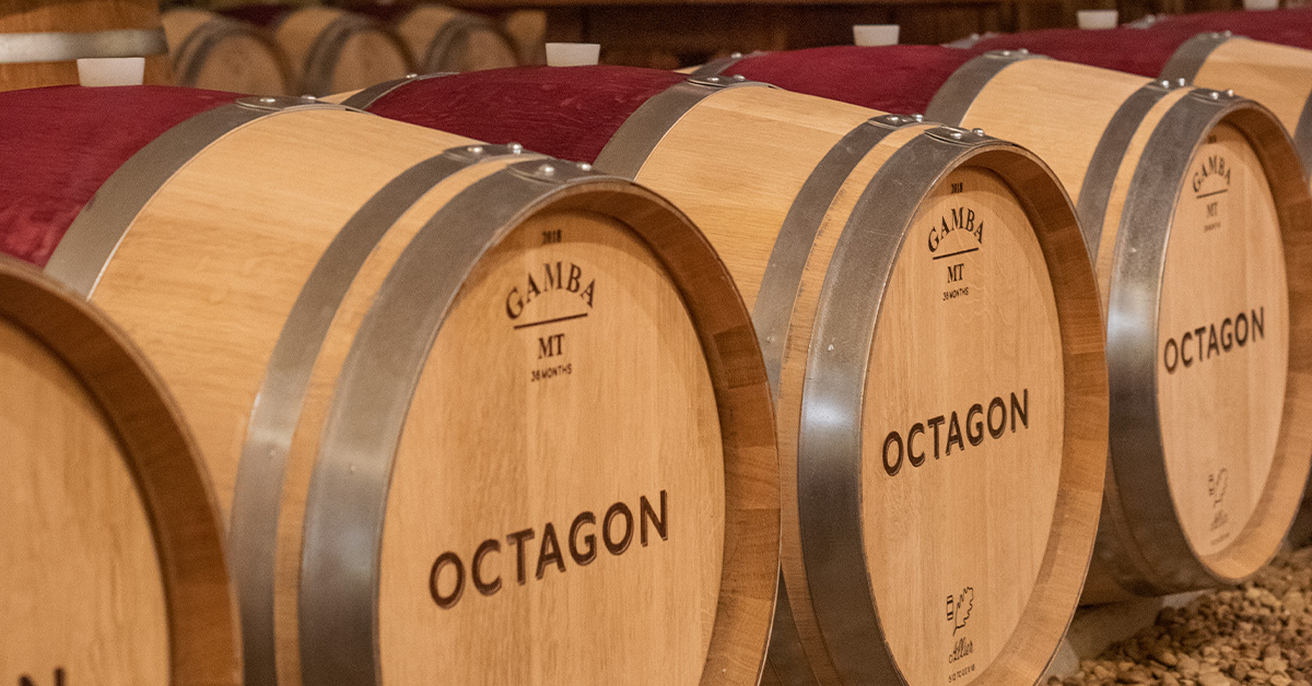 Barrels of aging award-winning Octagon wine in the barrel room at Barboursville Vineyards