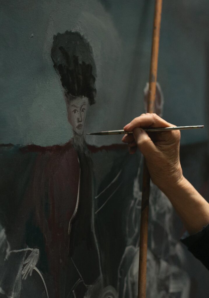 close-up of Beatrix Ost painting on a canvas