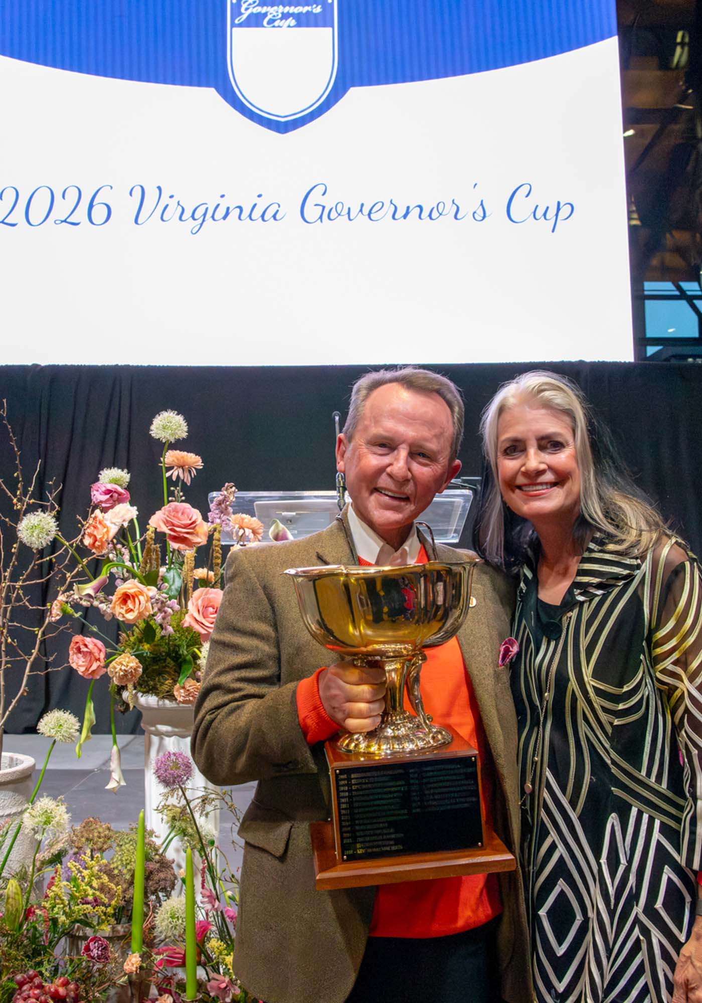 Stan and Barbara Joynes, owners of Valley Road Vineyards, posing with the Virginia Governor's Cup after winning in 2026