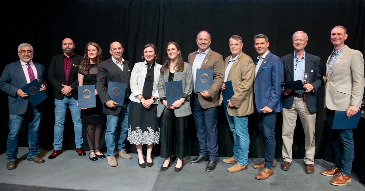 Virginia winemakers included in the 2026 Virginia Governor's Cup Case posing with the Secretary of Agriculture and Forestry Katie K. Frazier