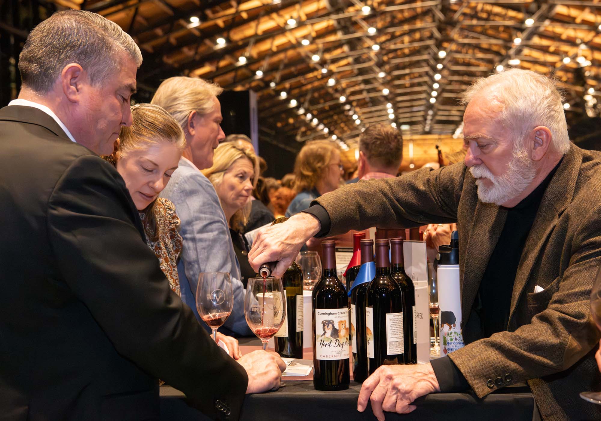 Winery associates from Cunningham Creek Winery pouring Gold-Winning Wine at the 2026 Virginia Governor's Cup