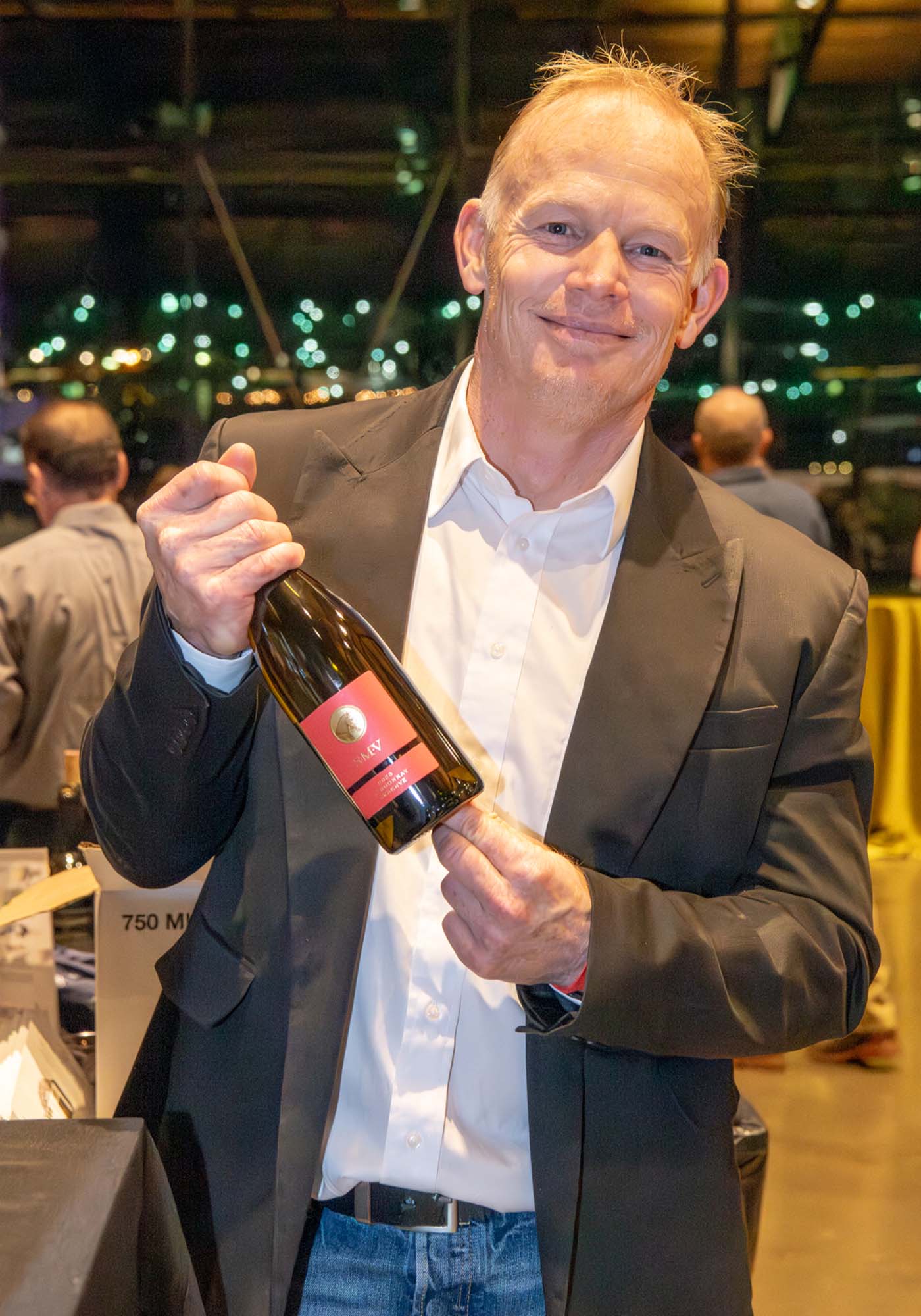 Boela Gerber, Winemaker at Southwest Mountains Vineyards, posing with his gold-medal wine at the 2026 Virginia Governor's Cup