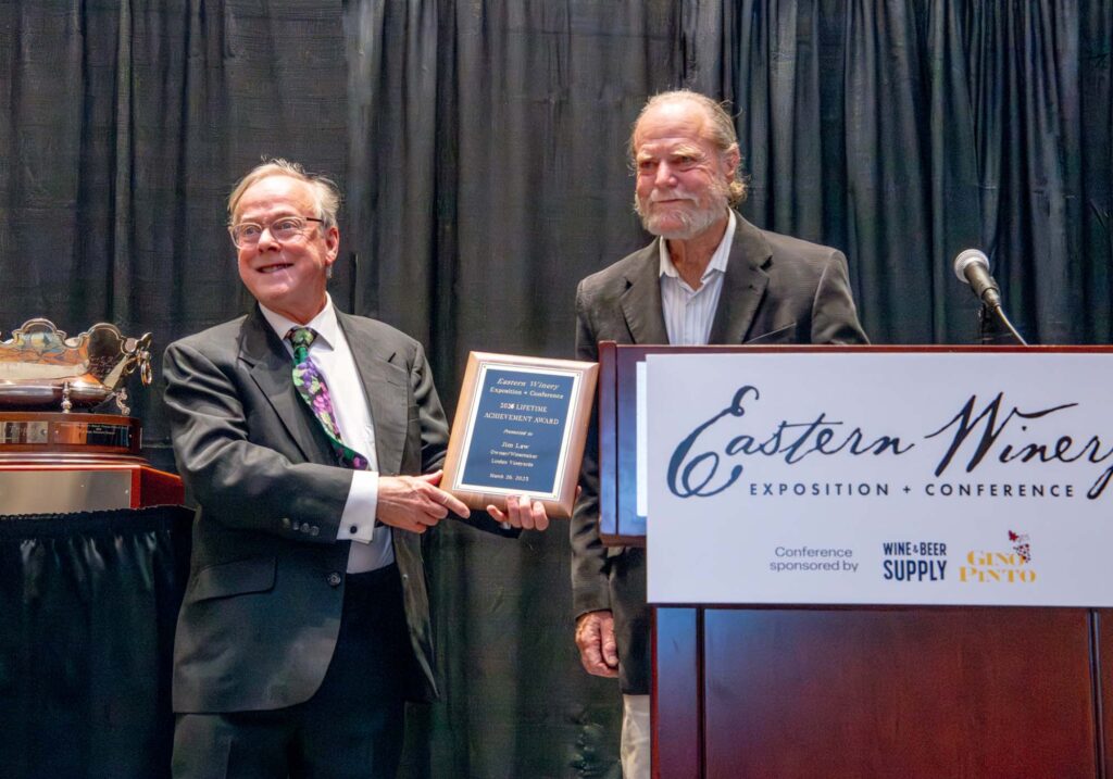 Jim Law accepting lifetime achievement award at Virginia wine industry event