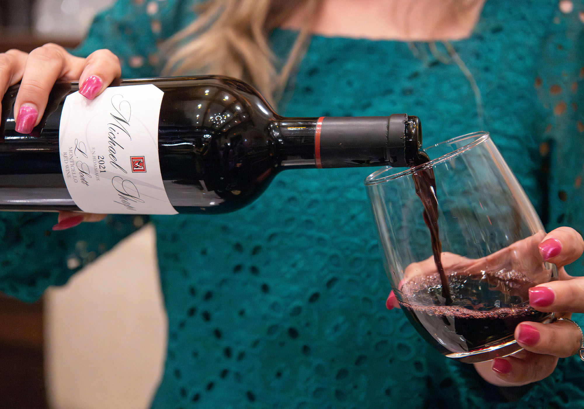 A server pours wine from Michael Shaps Wineworks during the 2026 Monticello Wine Trail Grand Tasting in Charlottesville.